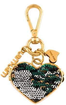 poodle-shaped charm miu miu|Miu Miu’s Greatest Hits Are Now Bougie Bag Charms .